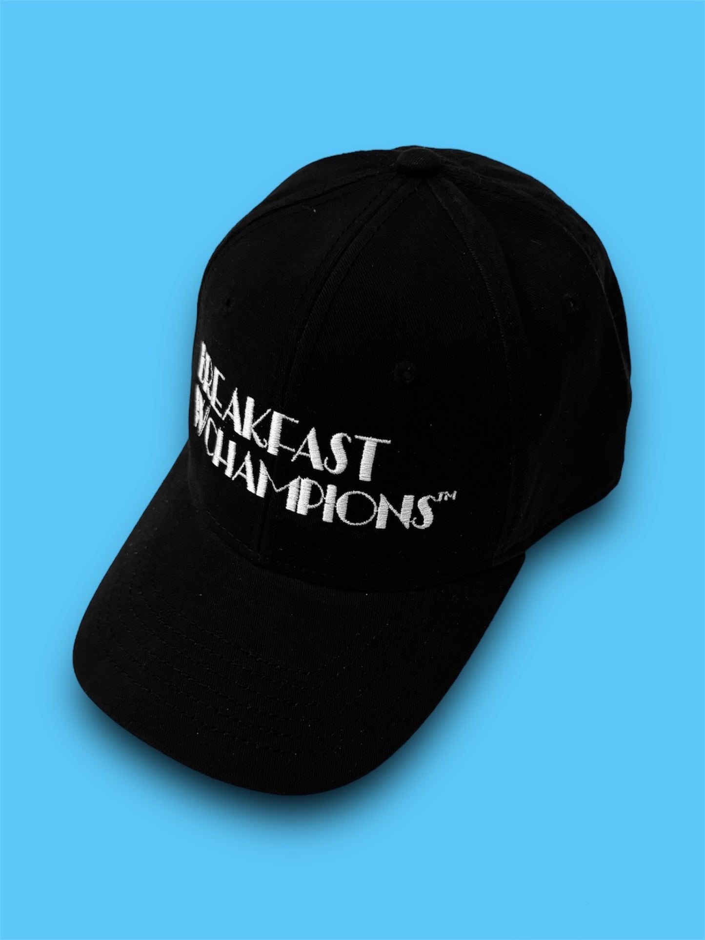 BREAKFAST WITH CHAMPIONS "ARTS & ENTERTAINMENT" CAP (BLK/WHITE)