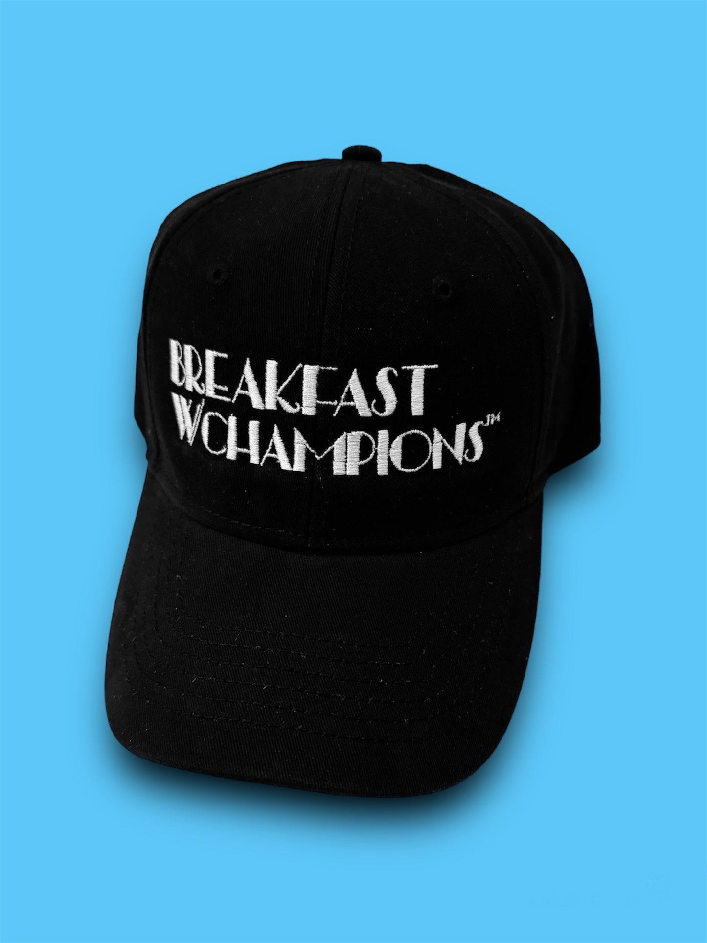 BREAKFAST WITH CHAMPIONS "ARTS & ENTERTAINMENT" CAP (BLK/WHITE)